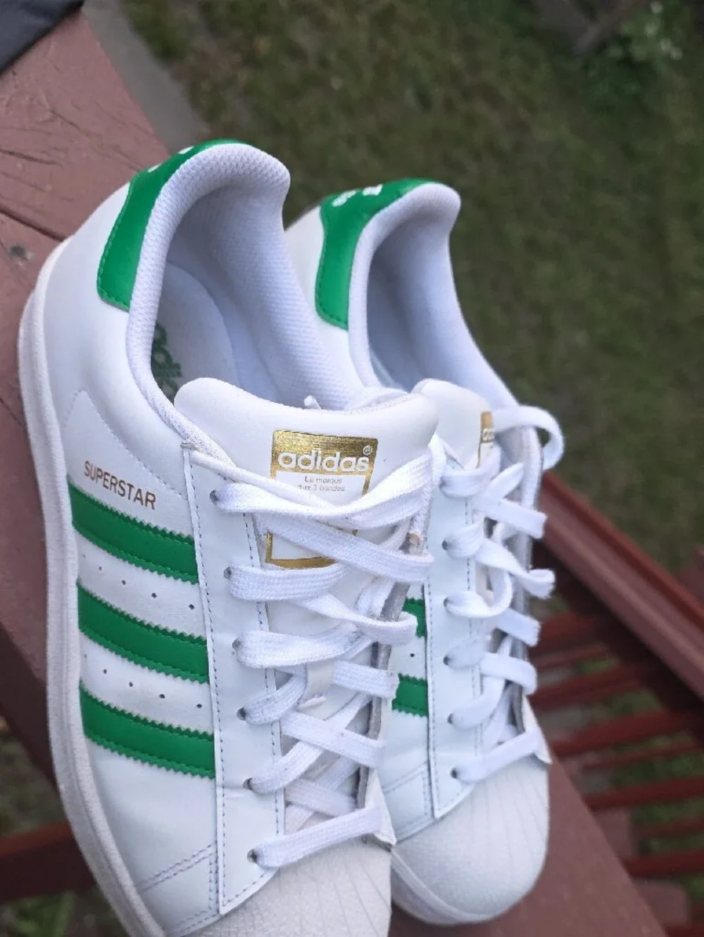 adidas White Sneakers with Green Stripes and Gold Accents